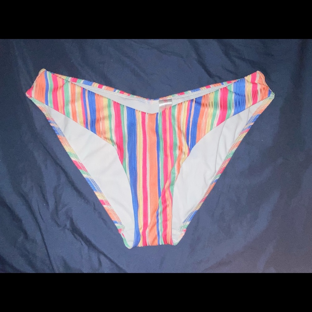 Colorful striped bikini bottoms, hugs hips very well